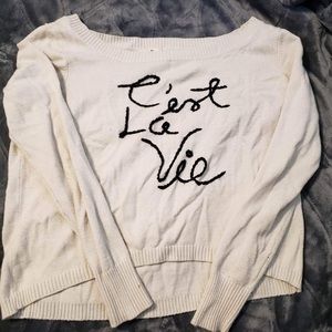 Cream sweater with french writing